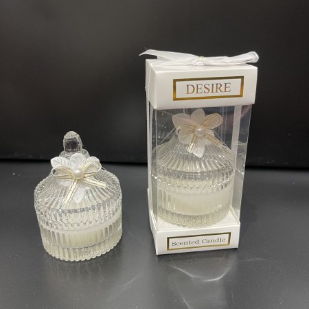 شمع معطر مصبوب داخل سكرية زجاج محزز وعلبة